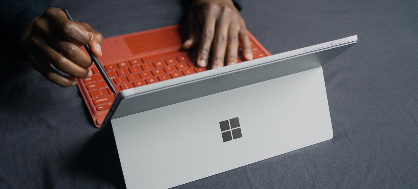 Man Working on a Tablet Man Working on a Tablet